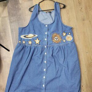 All over denim - plus sized pinafore with space embroidery theme on front